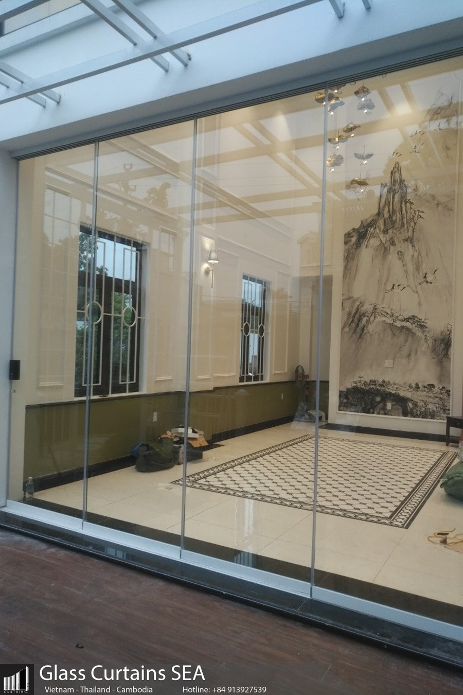 Thi công cửa kính lùa 4 cánh 4 ray tại Glass Curtain Sea